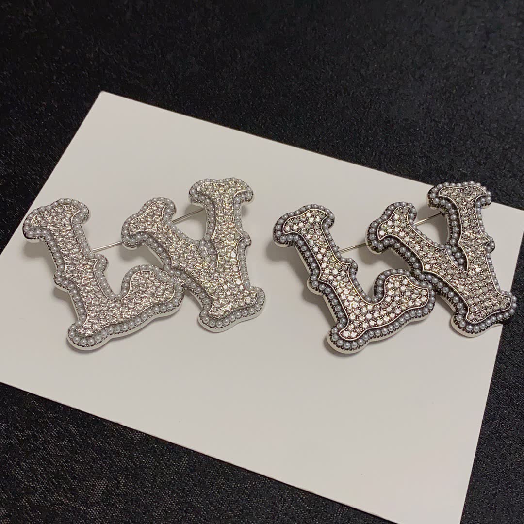 Louis Vuitton Crystal Embellished 'LV' Brooch